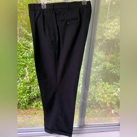 Men’s pleated 1&1/2” cuffed dress pants in charcoal black. Slant side pockets. - Picture 1 of 7